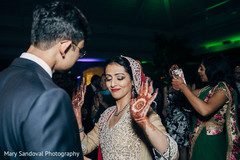 Indian bride and groom dancing dj and entertainment,indian wedding reception,indian groom suit,indian bride fashion