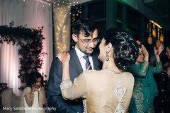 Indian groom dancing at wedding reception with his bride indian groom suit,dj and entertainment,indian wedding reception,indian bride fashion