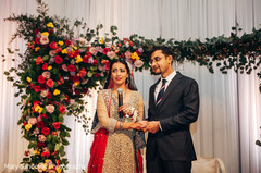 Emotional indian bride during her speech indian wedding ceremony floral and decor,indian wedding ceremony,indian groom suit,indian bride fashion