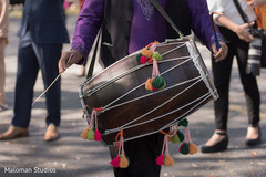 Dhol player. Dhol player.