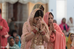 Sikh bride arriving to the sikh temple. sikh wedding ceremony,indian wedding photography