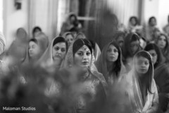 Indian -sikh bride escorted by her bridal party. sikh wedding ceremony,indian wedding photography,sikh bride