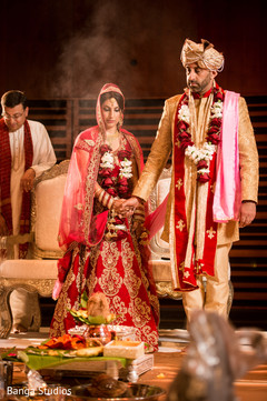 Indian bride and groom's Saptapadi ritual indian wedding ceremony,saptapadi ritual,indian bride fashion,indian groom fashion