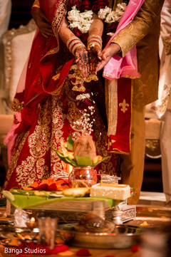 Indian bride and groom during wedding ceremony indian wedding ceremony,indian bride fashion,bride bangles