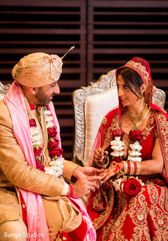 Indian groom holding bride's hand indian groom fashion,indian bride fashion,indian wedding ceremony
