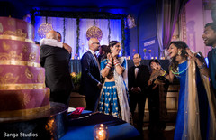 Indian bride and groom at wedding reception indian groom fashion,indian bride lengha,bride bangles,indian wedding reception