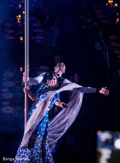Beautiful indian couple at wedding reception indian wedding reception,indian bride lengha,indian groom fashion