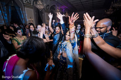 Indian bride dancing with wedding reception guests indian wedding reception,indian bride lengha,dj and entertainment