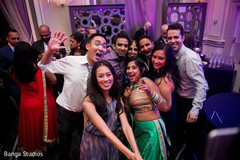 Indian bride with wedding reception guests taking a picture indian bride,indian wedding reception