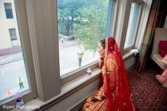 Lovely indian bride looking out the window Lovely indian bride looking out the window