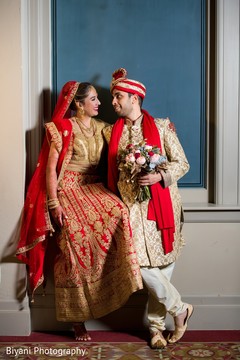 Indian bride and groom looking at each other Indian bride and groom looking at each other