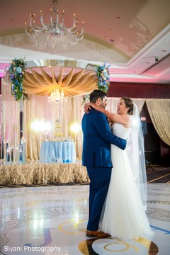Dazzling indian bride and groom dancing indian wedding reception,indian groom suit,indian bride reception fashion