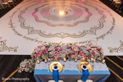 Indian bride and groom reception table and monogrammed dance floor Indian bride and groom reception table and monogrammed dance floor