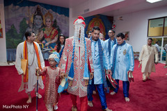 Indian Groom with groomsmen entering the ceremony venue. Indian Groom with groomsmen entering the ceremony venue.