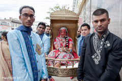 Beautiful bride carried in on a palanquin. Beautiful bride carried in on a palanquin.