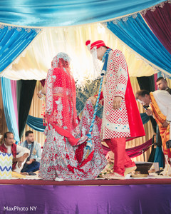 Indian couple surrounding the fire. indian groom,indian wedding ceremony,indian bride