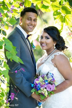 Effortless beautiful indian bride and groom. indian groom,indian bride,bridal bouquet,indian wedding photography