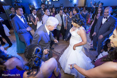 Bride showing off her moves at the dance floor. indian wedding reception,dj,indian bride