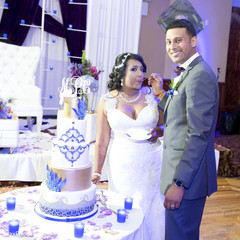 Wedding cake cutting moment. indian wedding reception,indian wedding cake,indian bride,indian groom