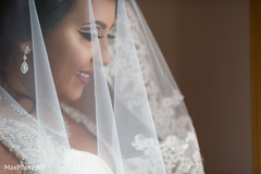 Maharani white wedding look. portrait,indian bride,white wedding dress,veil