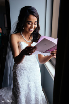 Indian bride reading a letter from the groom Indian bride reading a letter from the groom