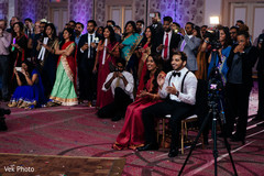 Indian bride and groom enjoying dance performances indian wedding reception,dj and entertainment