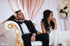 Indian bride and groom enjoying their wedding reception indian wedding reception,indian bride fashion,indian groom suit,indian wedding reception floral and decor