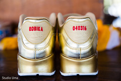 Golden shoes with Indian bride and groom's wedding date Golden shoes with Indian bride and groom's wedding date