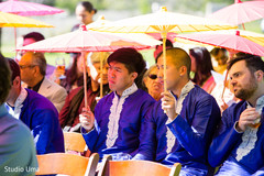 Indian groomsmen during wedding ceremony Indian groomsmen during wedding ceremony