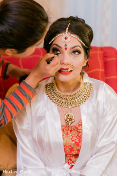 Indian bride makeup session. Indian bride makeup session.