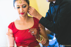 Lovely indian bride getting ready