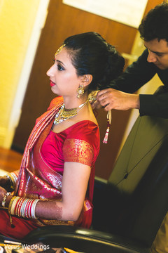 Adorable indian bride getting ready