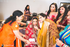 Indian bride with bridesmaids indian bride getting ready,indian bridesmaids,bridal jewelry