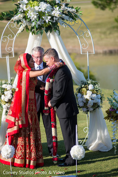 Garland exchange wedding ritual. indian bride,indian groom,indian fusion wedding ceremony,floral and decor,jaimala