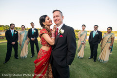 Indian Wedding picture in a field. indian bride,indian groom,indian fusion wedding ceremony,bridesmaids,groomsmen