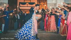 Guests celebrating the indian newlyweds bridal lengha,reception lengha,indian wedding reception
