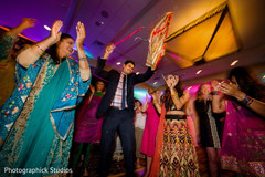 Indian bride and groom dancing on sangeet Indian bride and groom dancing on sangeet