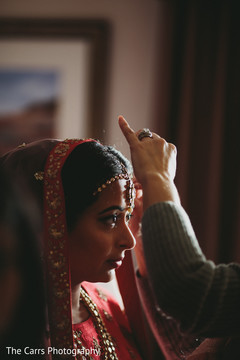 Indian bride being dolled up. Indian bride being dolled up.