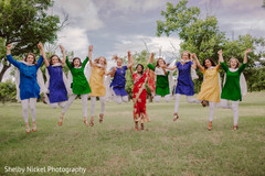 Indian bride with bridesmaids posing Indian bride with bridesmaids posing