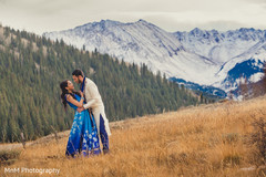 Indian engaged couple captured in a field. Indian engaged couple captured in a field.