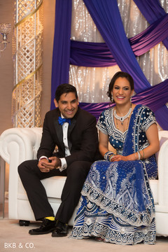 Sweet Indian couple at their wedding reception. Sweet Indian couple at their wedding reception.