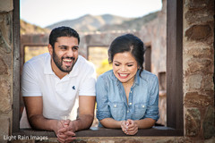 Indian bride and groom laughing Indian bride and groom laughing