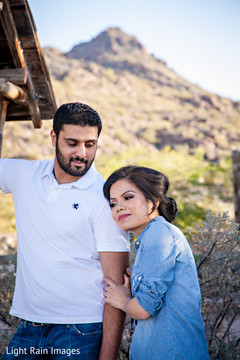Indian bride and groom posing for photo shoot Indian bride and groom posing for photo shoot