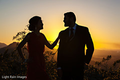 Indian couple silhouette at sunset Indian couple silhouette at sunset