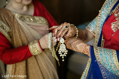 Indian bride putting jewelry on bridal jewelry,indian bride,indian bridal mehndi