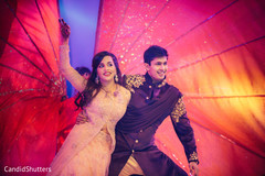 Indian bride and groom during sangeet Indian bride and groom during sangeet