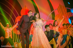 Indian bride and groom on their sangeet celebration Indian bride and groom on their sangeet celebration