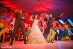 Lovely indian bride and groom during sangeet night Lovely indian bride and groom during sangeet night