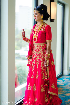 Indian bride glowing in her wedding attire. indian bride,bridal lengha,indian bride fashion