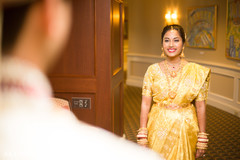 South indian bride wearing a yellow ceremony saree. South indian bride wearing a yellow ceremony saree.